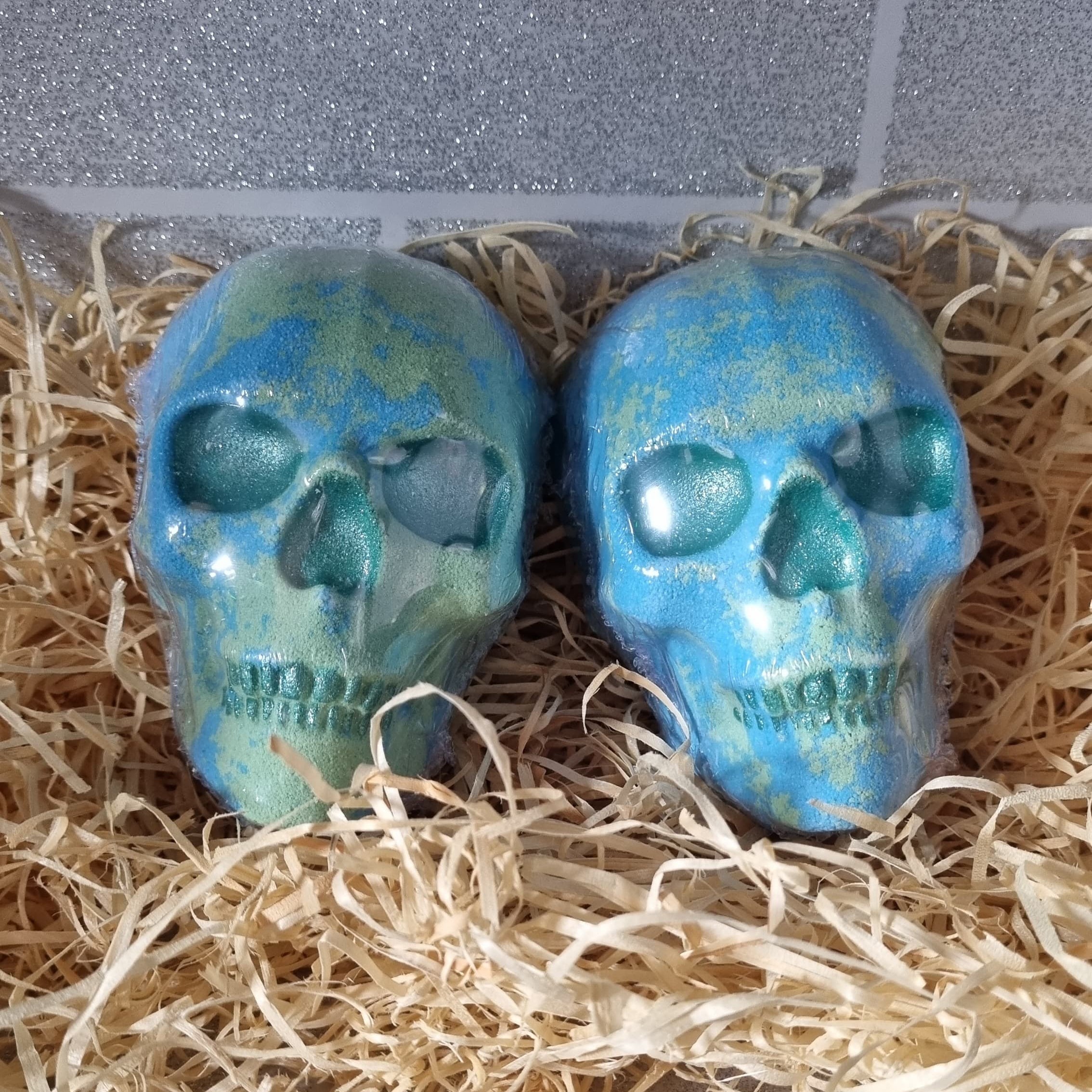 bathbomb in shape of a skull scented in Savage weighing approx 220g